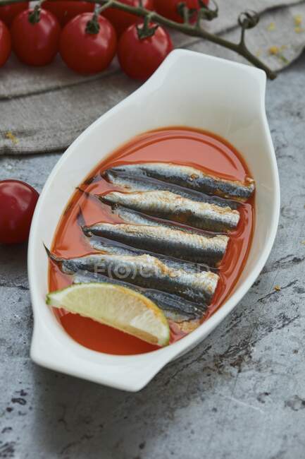 Marinated sardines in a serving bowl — Stock Photo