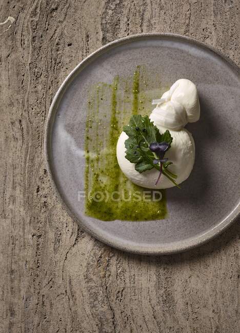 Burrata cheese with cabbage leaves — Stock Photo