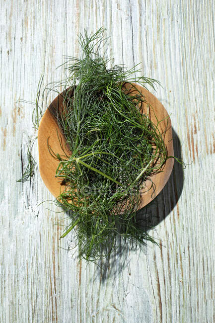 Rosemary on a wooden background. dill, thyme and herbs — Stock Photo