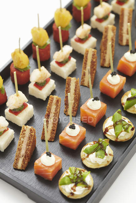 Canapes, catering and snacks. canape with cheese. — Stock Photo