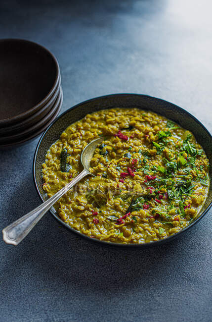 Indian dhal made with spices, lentils, coconut fresh curry leaves, chilli and fresh coriander — Stock Photo