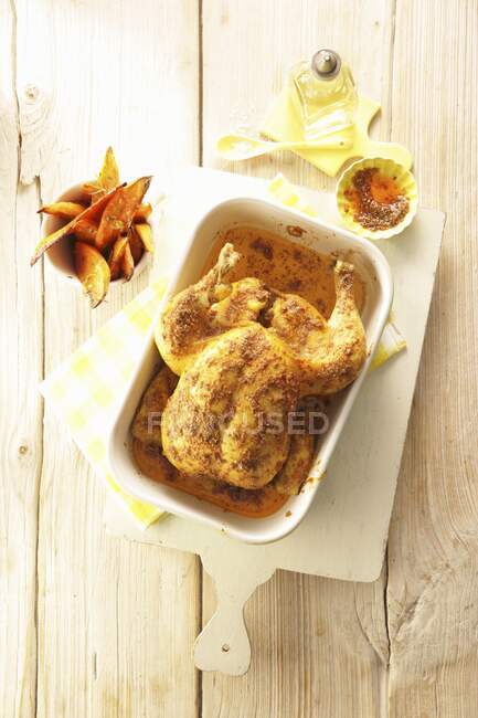 Spicy roast chicken with harissa oil — Stock Photo
