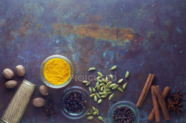 Various spices on a metal surface — Stock Photo