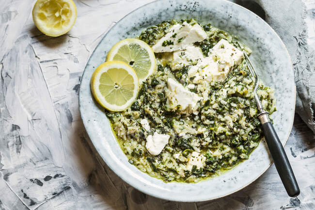 Spanakorizo (Greek rice with spinach and feta) — Stock Photo