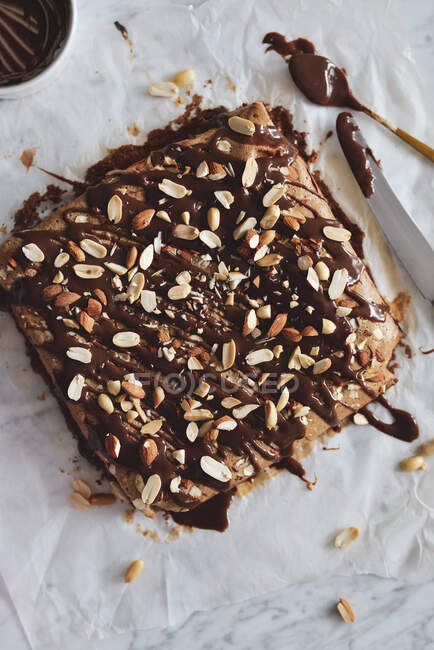 Chocolate brownie with peanut butter and almonds — Stock Photo