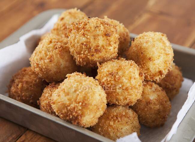Fried potato balls filled with cheese (USA) — Stock Photo