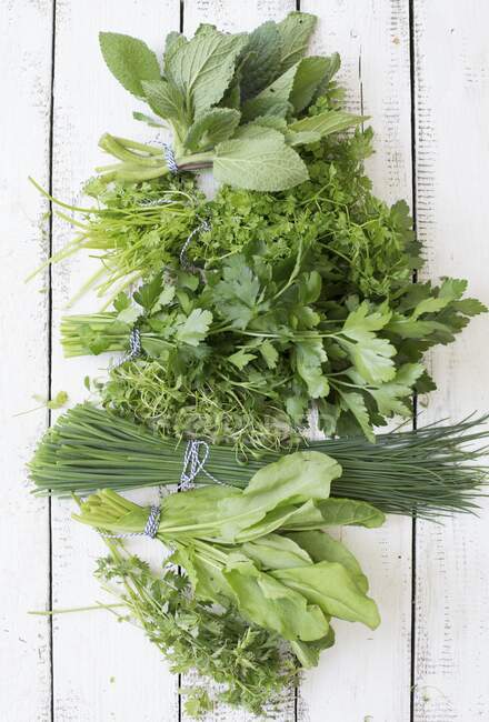 Fresh herbs for making green sauce — Stock Photo
