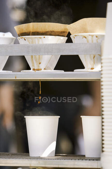 Making cups of drip coffee at the Ferry Plaza Farmers Market in San Francisco, CA — Stock Photo
