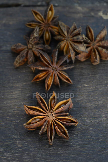 Star anise on wooden background — Stock Photo