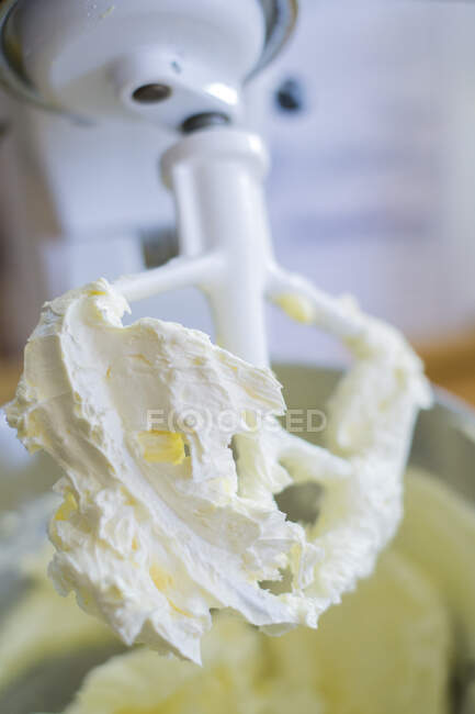 Batter on a food processor whisk — Stock Photo