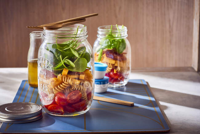A layered salad in a jar — Stock Photo