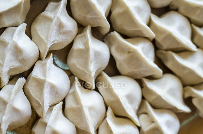 Top down view of freshly home made chinese dumplings — Stock Photo