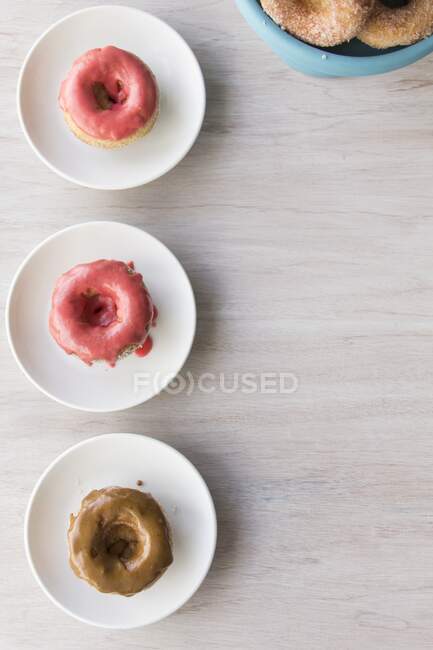 Homemade doughnuts with different colored glazing — Stock Photo