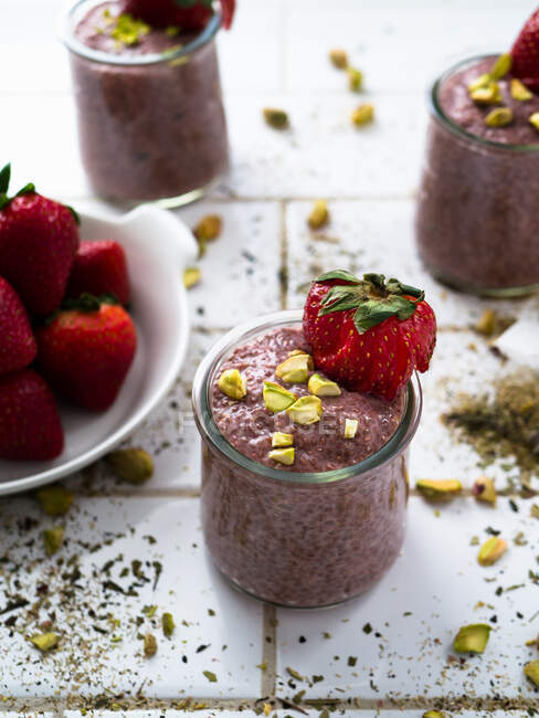 Strawberry Chia Pudding topped with pistachios — Stock Photo