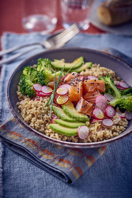 Grain salad with salmon, avocado and broccoli — Stock Photo