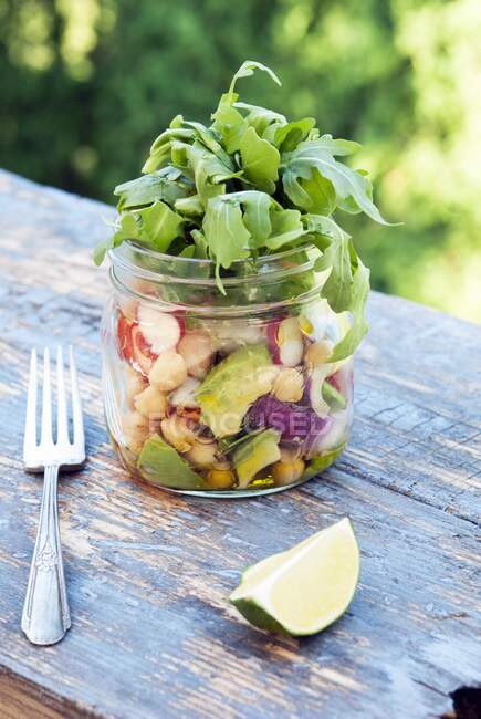 Healthy salad to go in a mason jar — Stock Photo