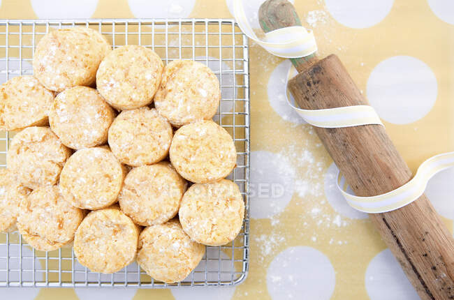 Pumpkin scones on a cooling rack — Stock Photo