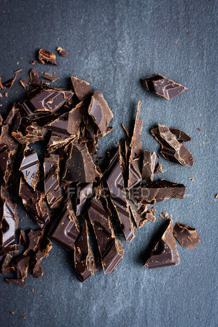 Chopped chocolate, closeup shot in studio — Stock Photo