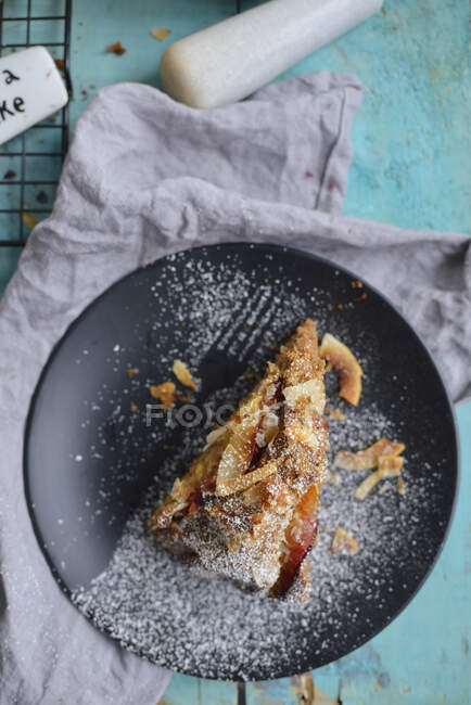 Autumn cake with plums and coconut — Stock Photo
