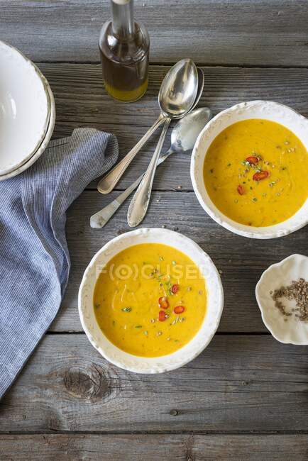 Roasted pumpkin soup with chili and rosemary — Stock Photo