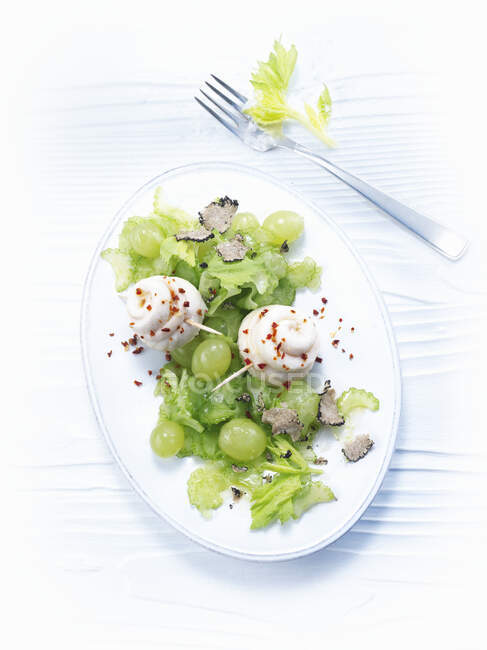 Truffled celery with grapes and sole rolls — Stock Photo