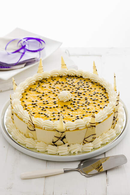Passionfruit cheesecake on the table — Stock Photo