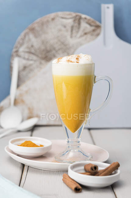 Turmeric latte with cinnamon — Stock Photo