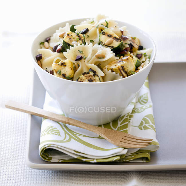 Pasta salad with grilled pumpkin and zucchinis — Stock Photo