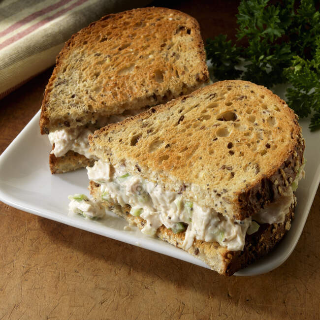 Chicken salad sandwich on toasted multigrain bread — Stock Photo