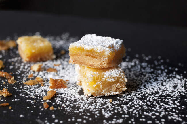 Stacked Lemon Bars Dusted with Icing Sugar — Stock Photo
