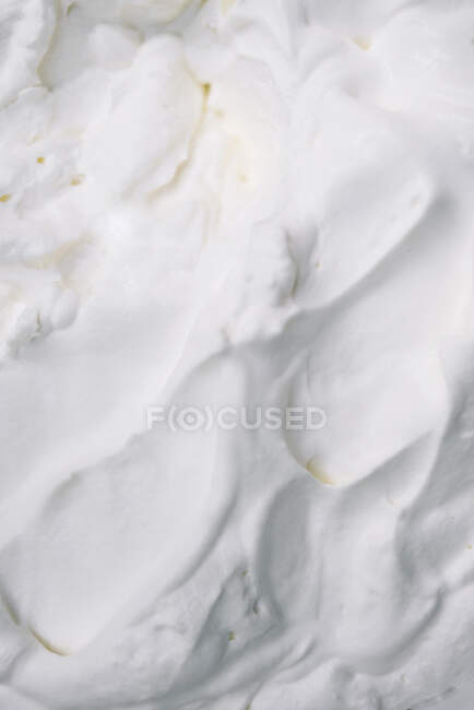 Fresh whipped cream (full frame) — Stock Photo