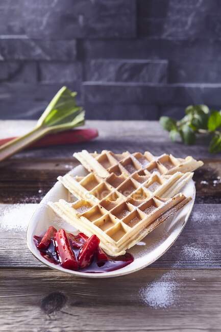 Waffles with rhubarb close-up view — Stock Photo