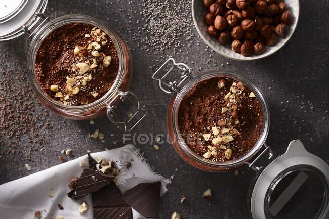 Chia puddings with chocolate and hazelnuts — Stock Photo