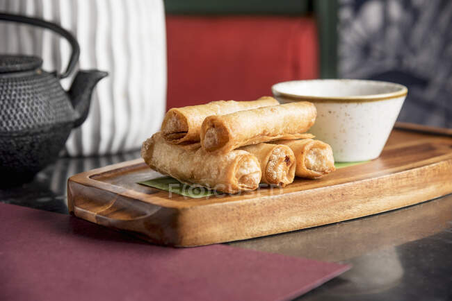 Filipino style shredded smoked fish in a spring roll wrapper — Stock Photo