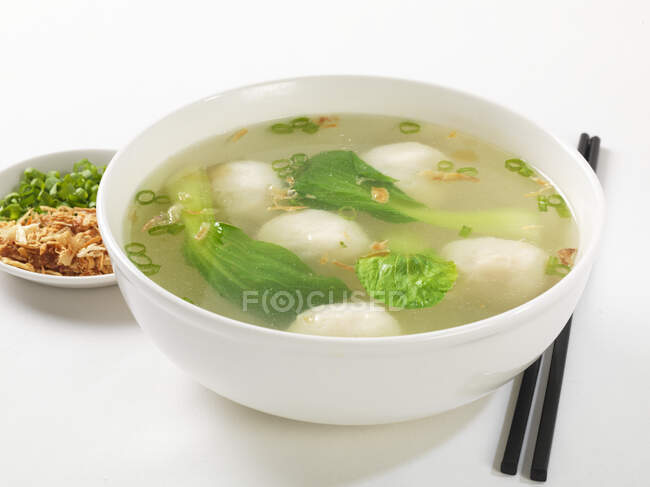 Fish ball soup with pak choi — Stock Photo