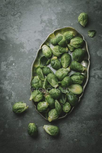 Brussel sprouts on a grey background — Stock Photo