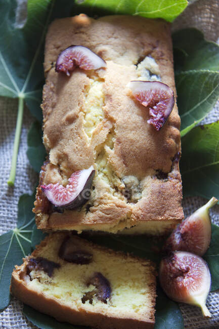 Fig cake, a piece removed — Stock Photo