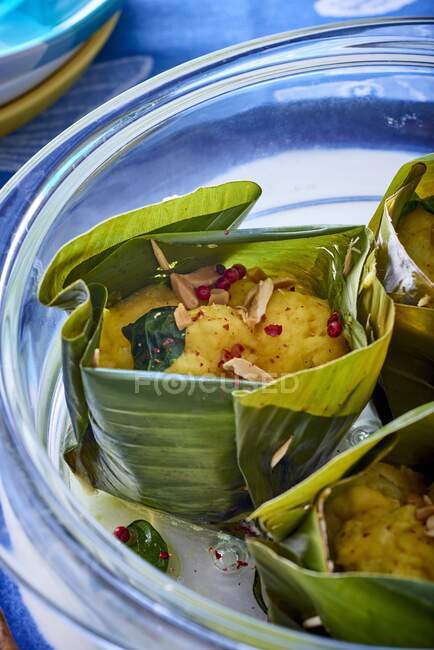 Fish amok in a banana leaf (traditional Cambodian seafood curry) — Stock Photo