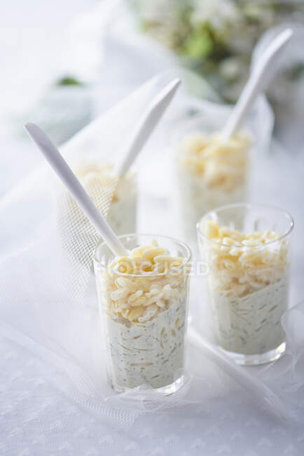 Herb risotto in glasses — Stock Photo