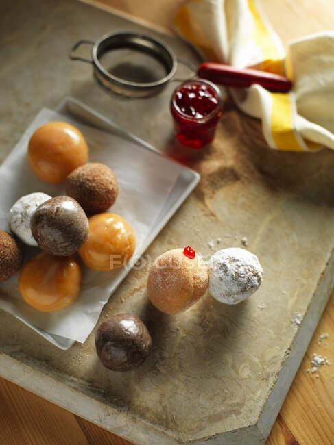 Various pralines on a baking tray — Stock Photo