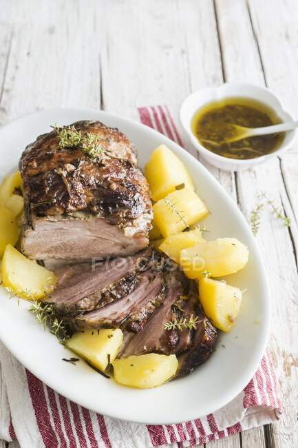 Crown Roast of Pork with Potatoes on a Platter — Stock Photo