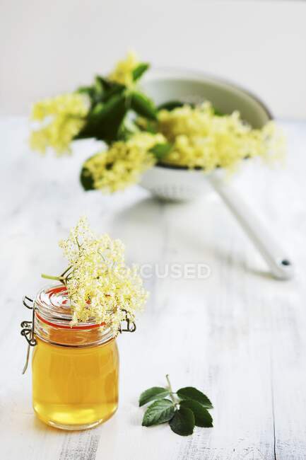 Homemade elderberry syrup in a jar — Stock Photo