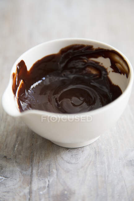 Melted chocolate in a bowl — Stock Photo