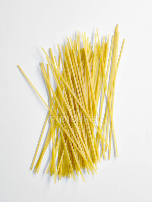 Linguine on white close-up view — Stock Photo