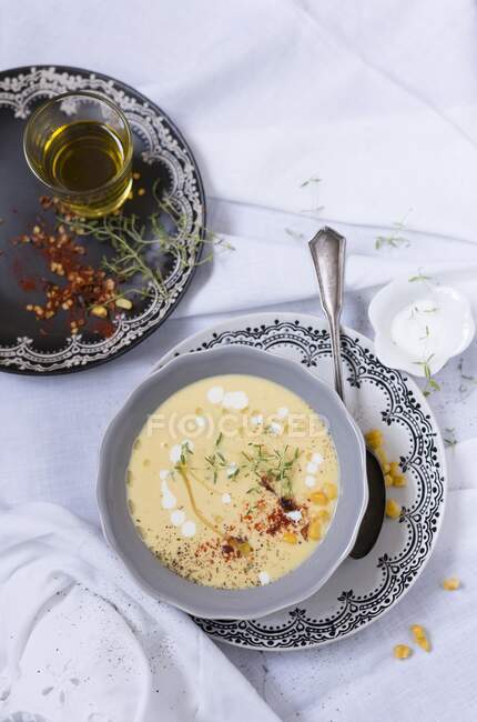 Creme soup with sweetcorn and chili flakes — Stock Photo
