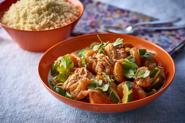 Tagine with chicken and dried apricots — Stock Photo