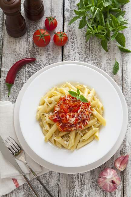 Penne with chili tomato sauce — Stock Photo