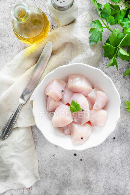 Chicken breast in small pieces ready to cook — Stock Photo