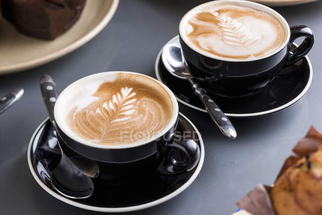 Flat whites in two cups (Australia) — Stock Photo