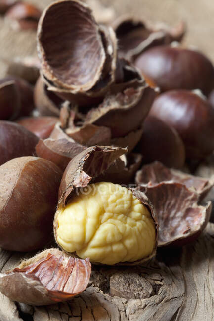 Chestnuts, partially shelled close-up view — Stock Photo